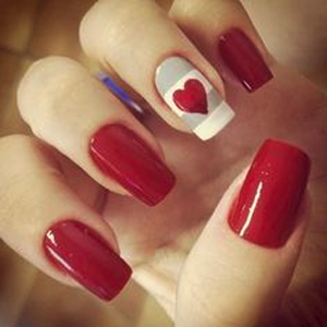 Unhas decoradas vermelhas