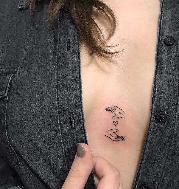 tatuagem feminina delicada minimalista