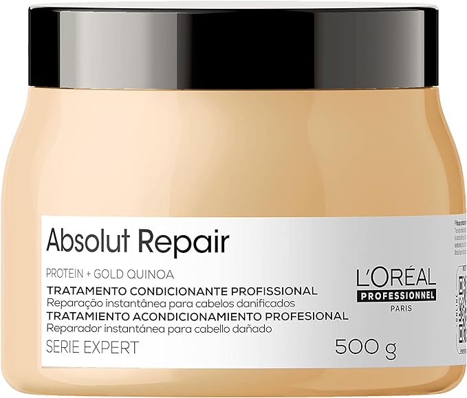 Cabelos Porosos. Embalagem de máscara de tratamento com escrita Absolut Repair L'Oreal. Traz cor bege com tampa de cor preta.