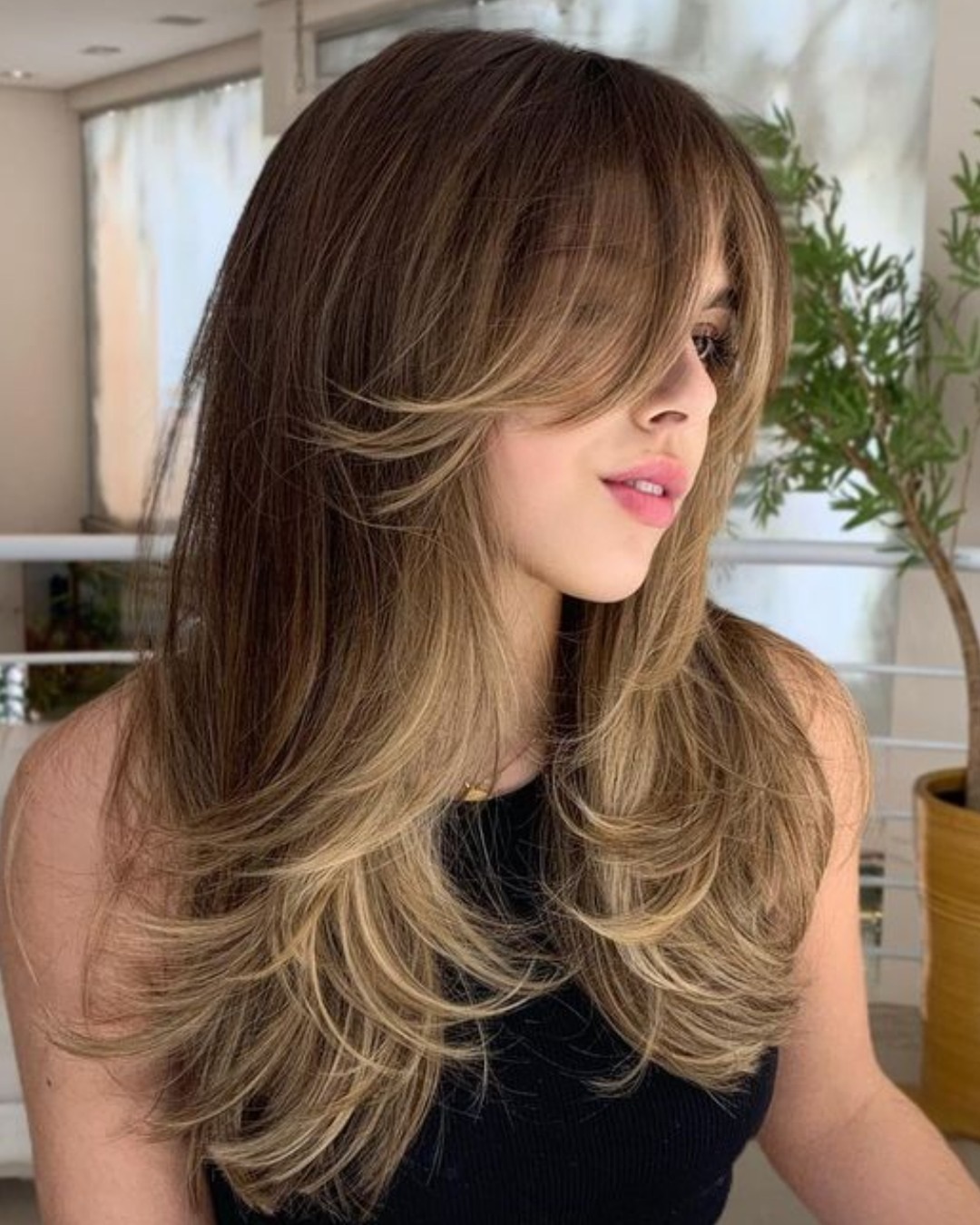 corte de cabelo com camadas longas